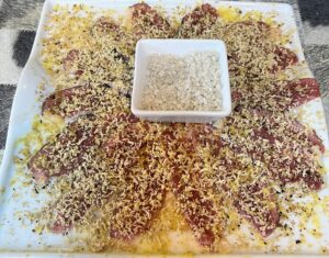 Carpaccio de magret de canard y foie rallado.